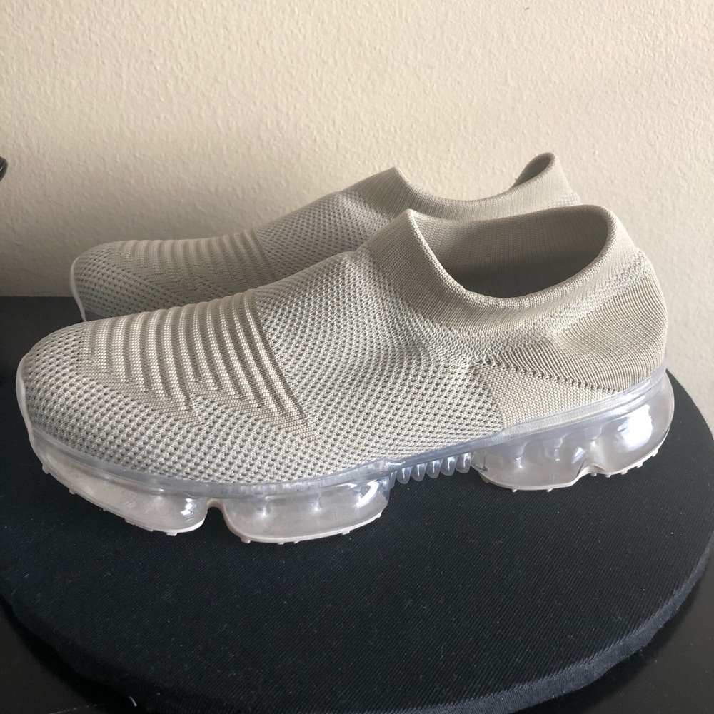 Size 10W, nude/tan colored sneaker